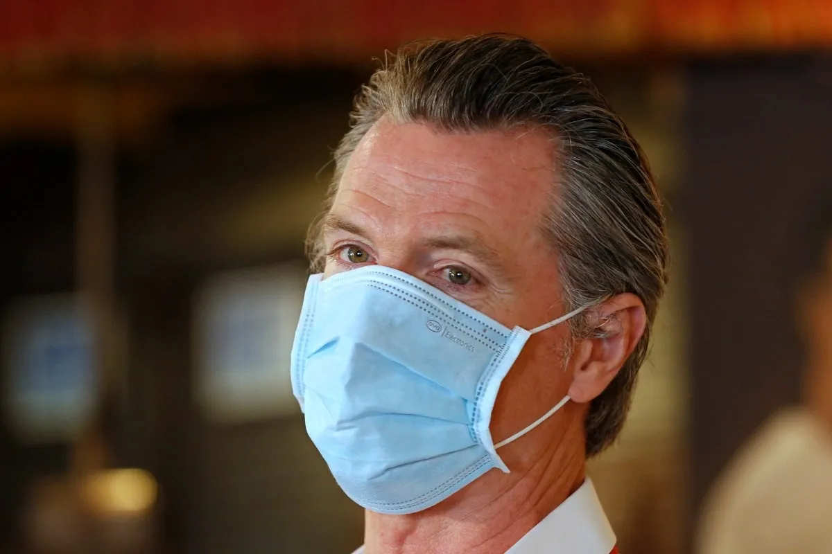 Gavin Newsom wearing a mask